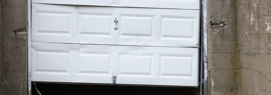Garage Door Got Hit By A Car Dent Removal in Oshawa, ON