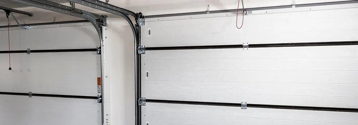 Fix Folding Garage Door Jerking in Oshawa, Ontario